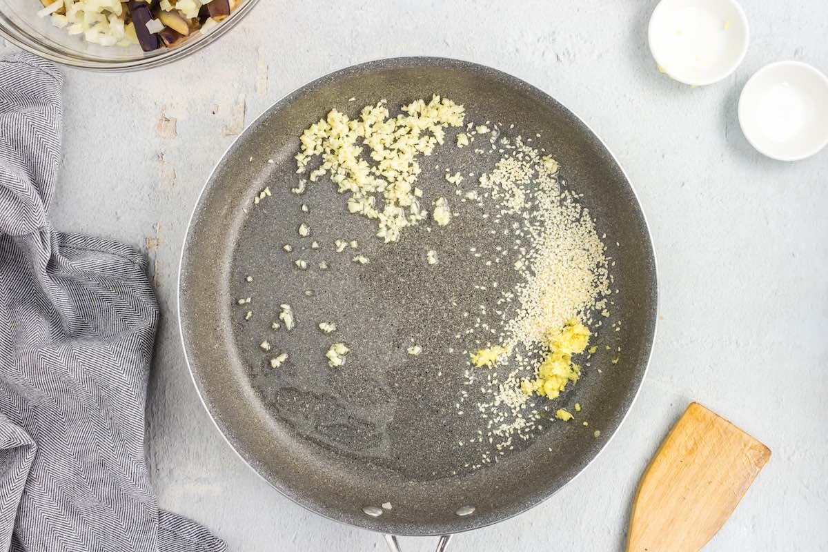 aromatics in a skillet.