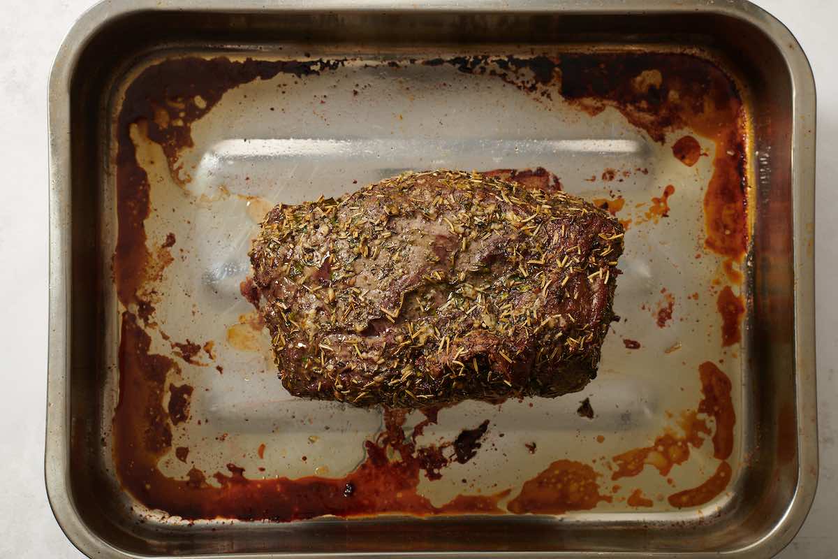 roasted beef in a roasting pan.