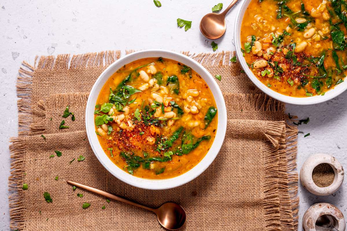 ready to serve Tuscan white bean soup.