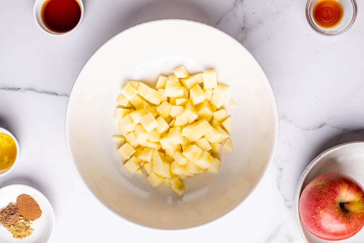 chopped and peeled apples in a bowl.