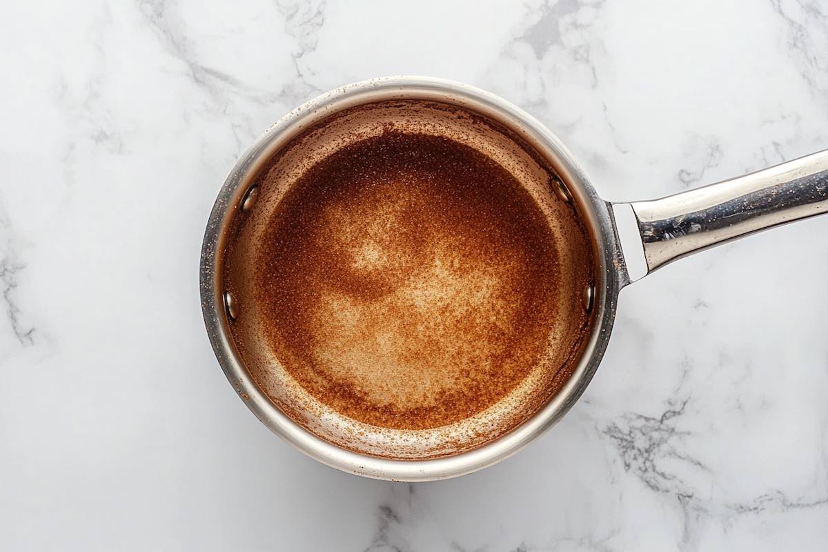 sugar syrup and cinnamon in saucepan.