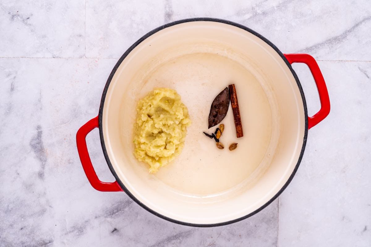 spices toasting in pot.