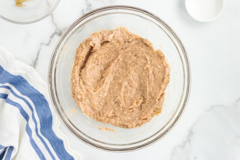 ground chicken with spices and honey in a bowl.