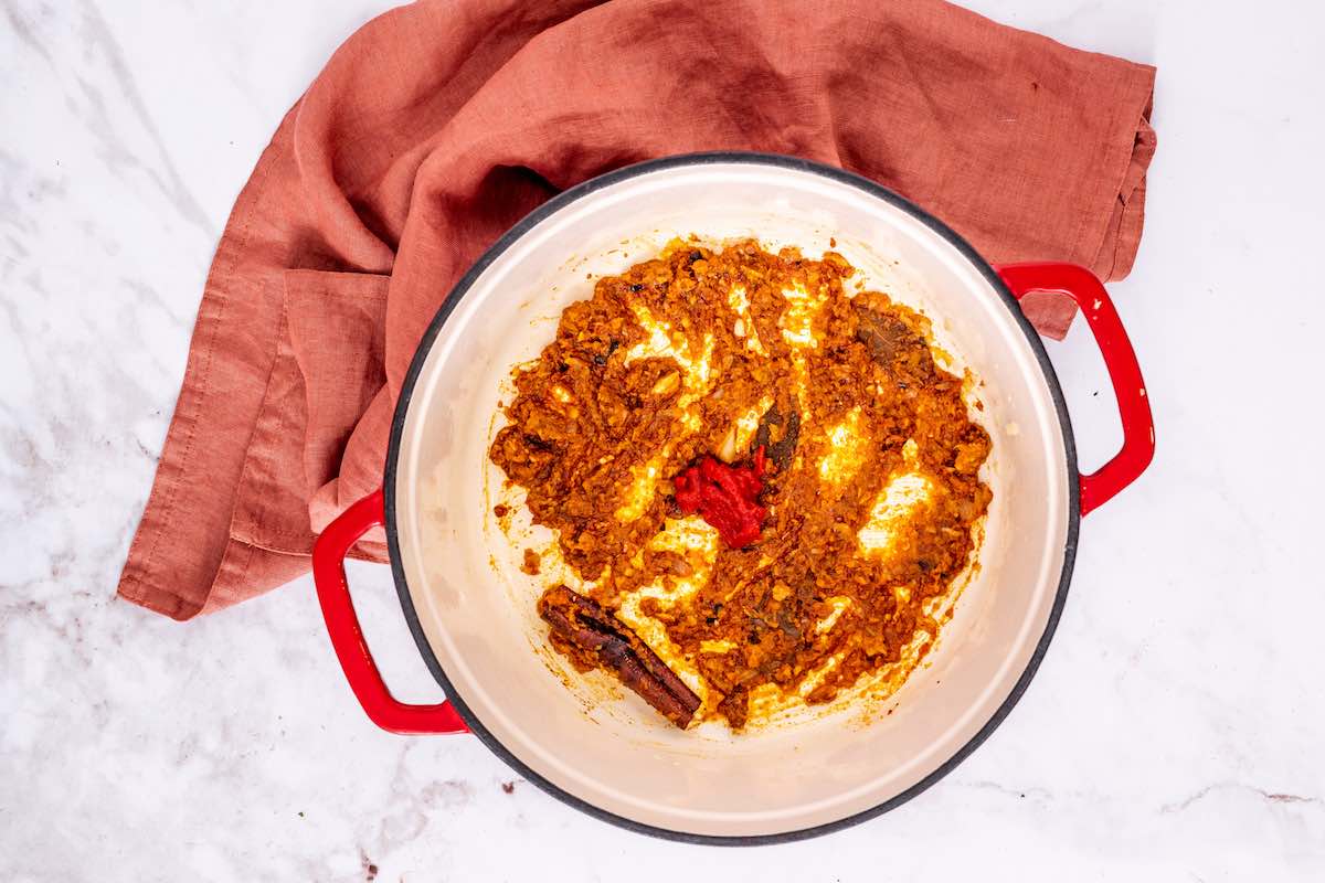 tomato paste added to skillet.