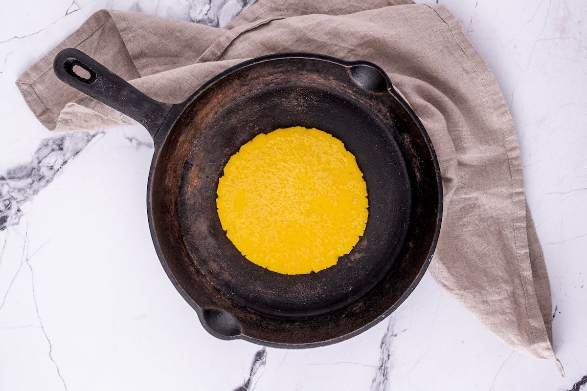 pan frying sopes in a skillet.