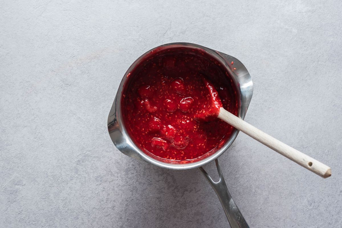 raspberry topping in a small saucepan.