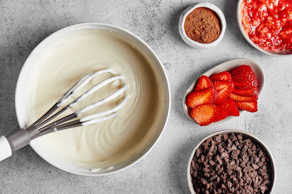 condensed milk and heavy cream in a bowl.