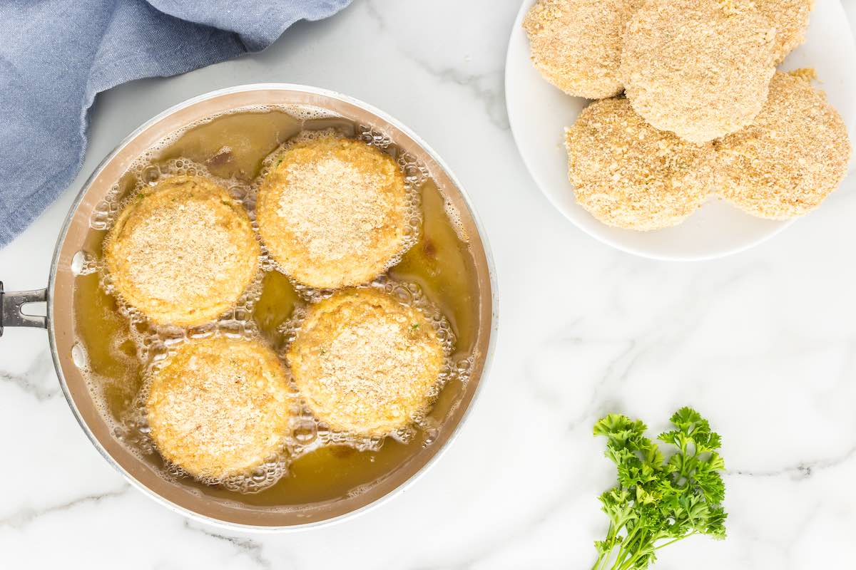 tuna croquettes frying in oil.