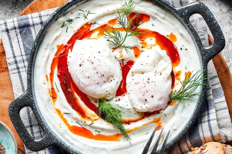 assembled turkish eggs with yogurt.