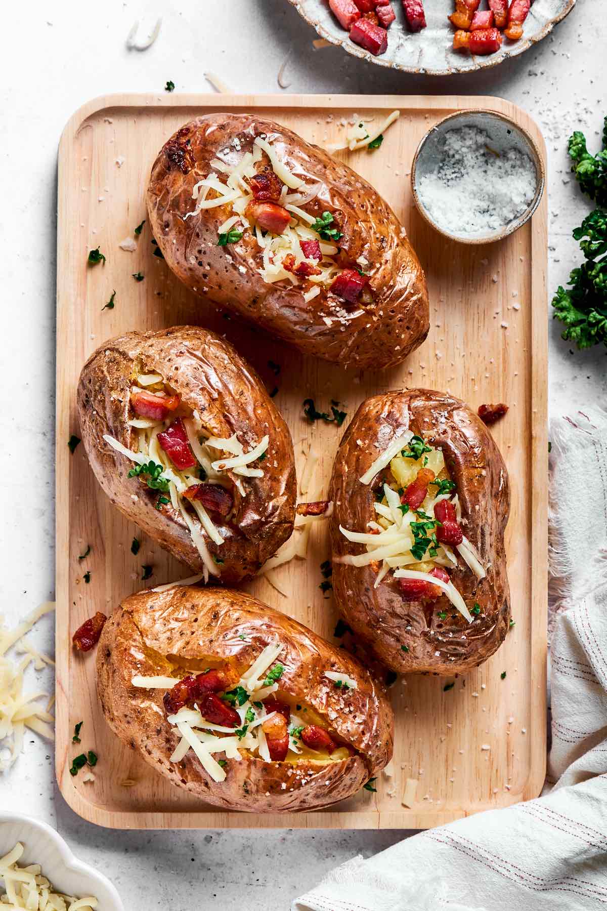 microwave baked potatoes with butter and fillings.