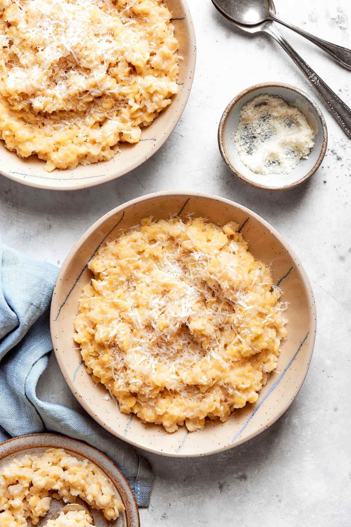 pastina with shredded parmesan cheese on top.