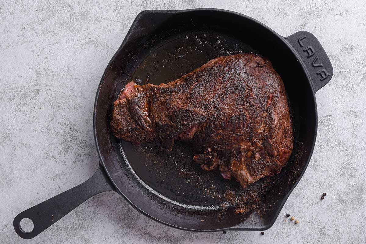 seared tri tip in the skillet.