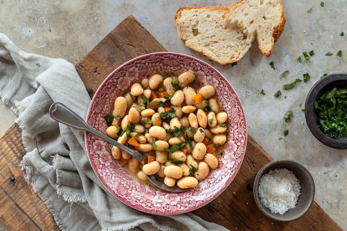 cooked butter beans in a bowl.