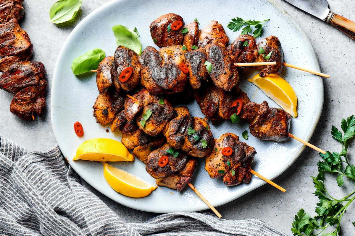 cooked chicken livers on a plate.