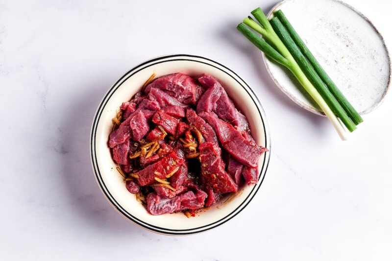 meat and bulgogi sauce in a bowl.