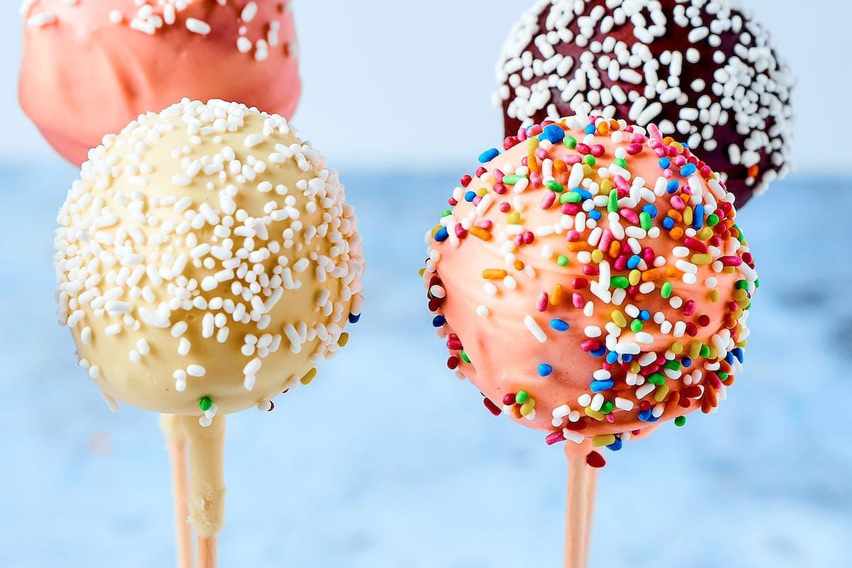 frosted and sprinkle topped cake pops.