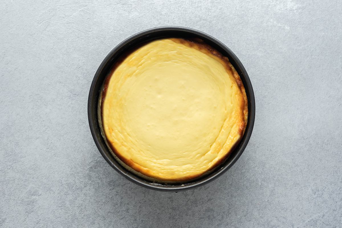 baked cheesecake in pie tin.