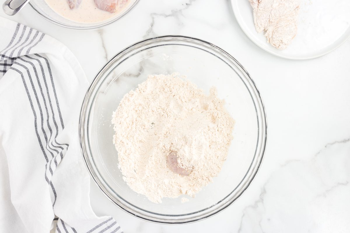 raw chicken in flour.