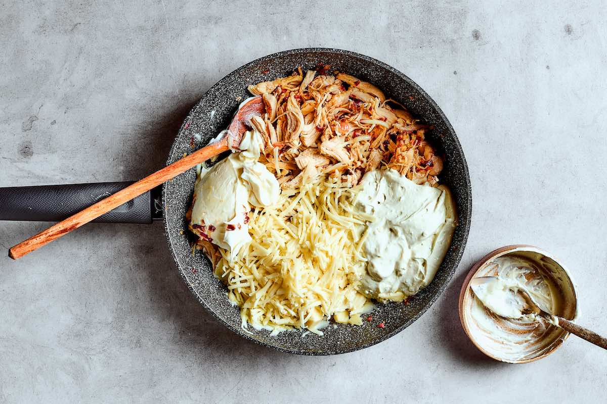 skillet with spaghetti squash, shredded chicken, and cream cheese.