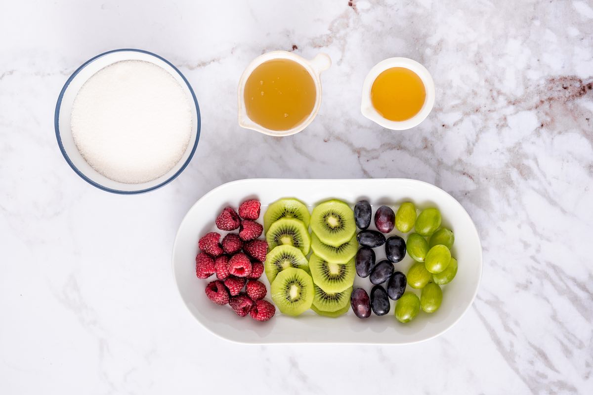 chopped fruit and syrup in bowls.