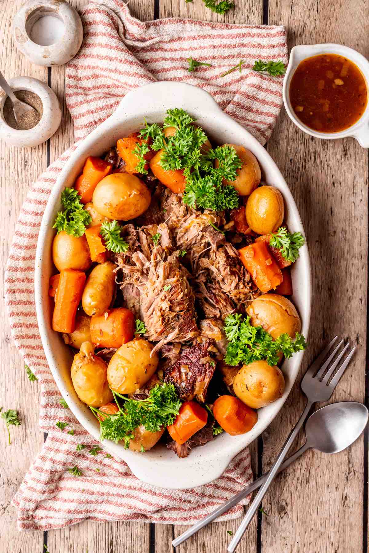 Instant Pot chuck roast with potatoes, carrots, and gravy.