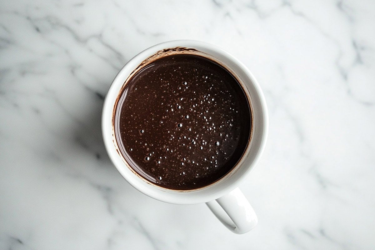 mug cake batter in mug.