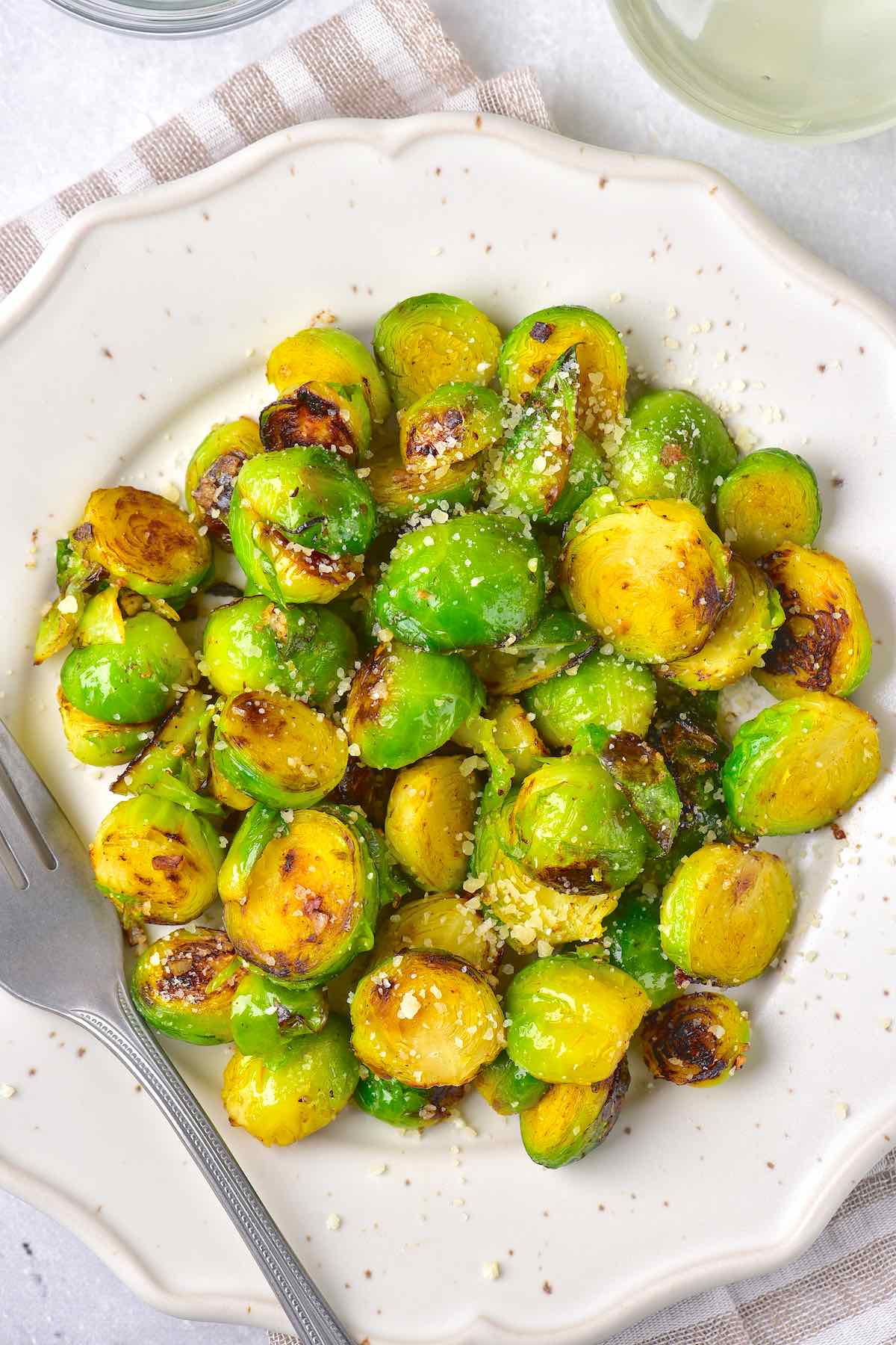 sauteed sprouts on a plate.