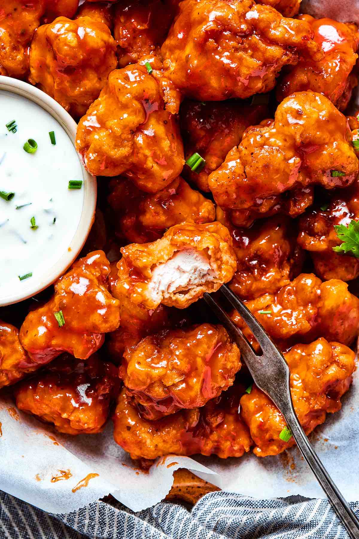 boneless chicken wings with dipping sauce.