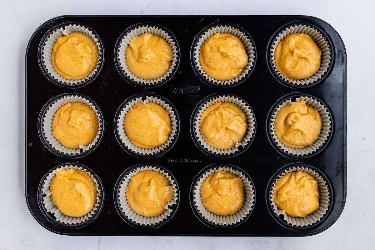 muffin batter in muffin tin.