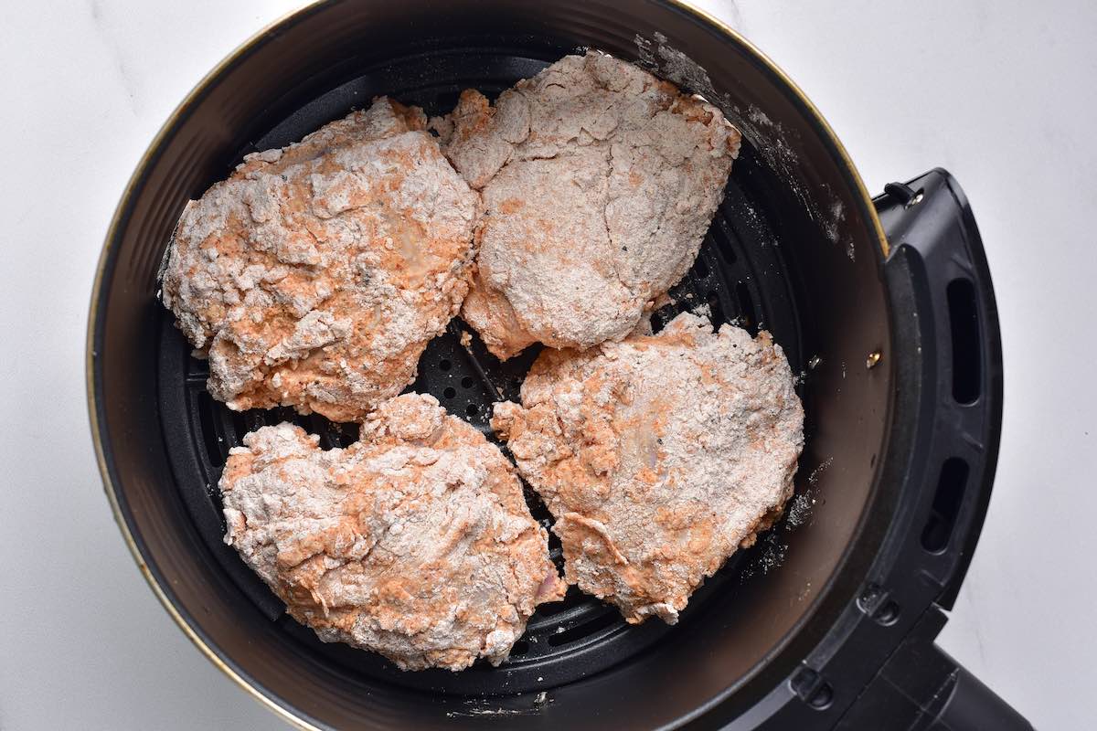 raw breaded chicken in the air fryer. 