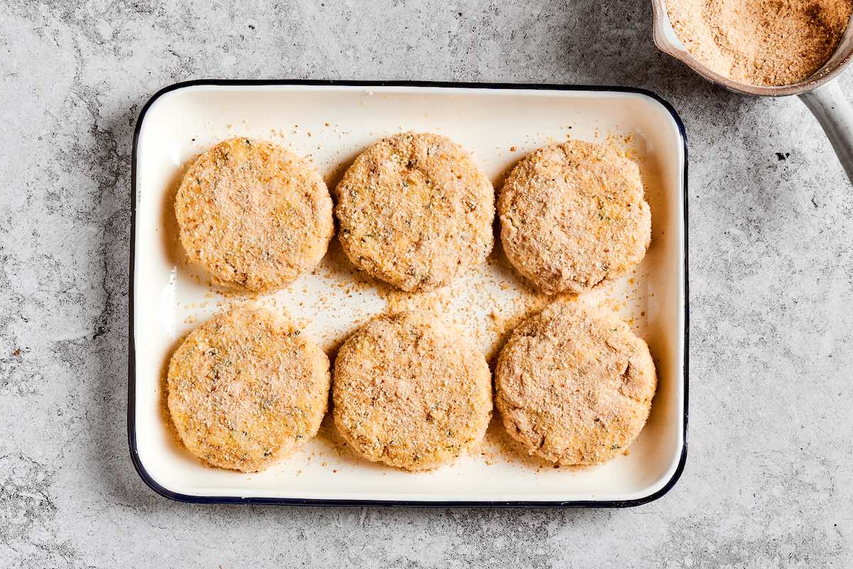 shaped uncooked chicken patties.