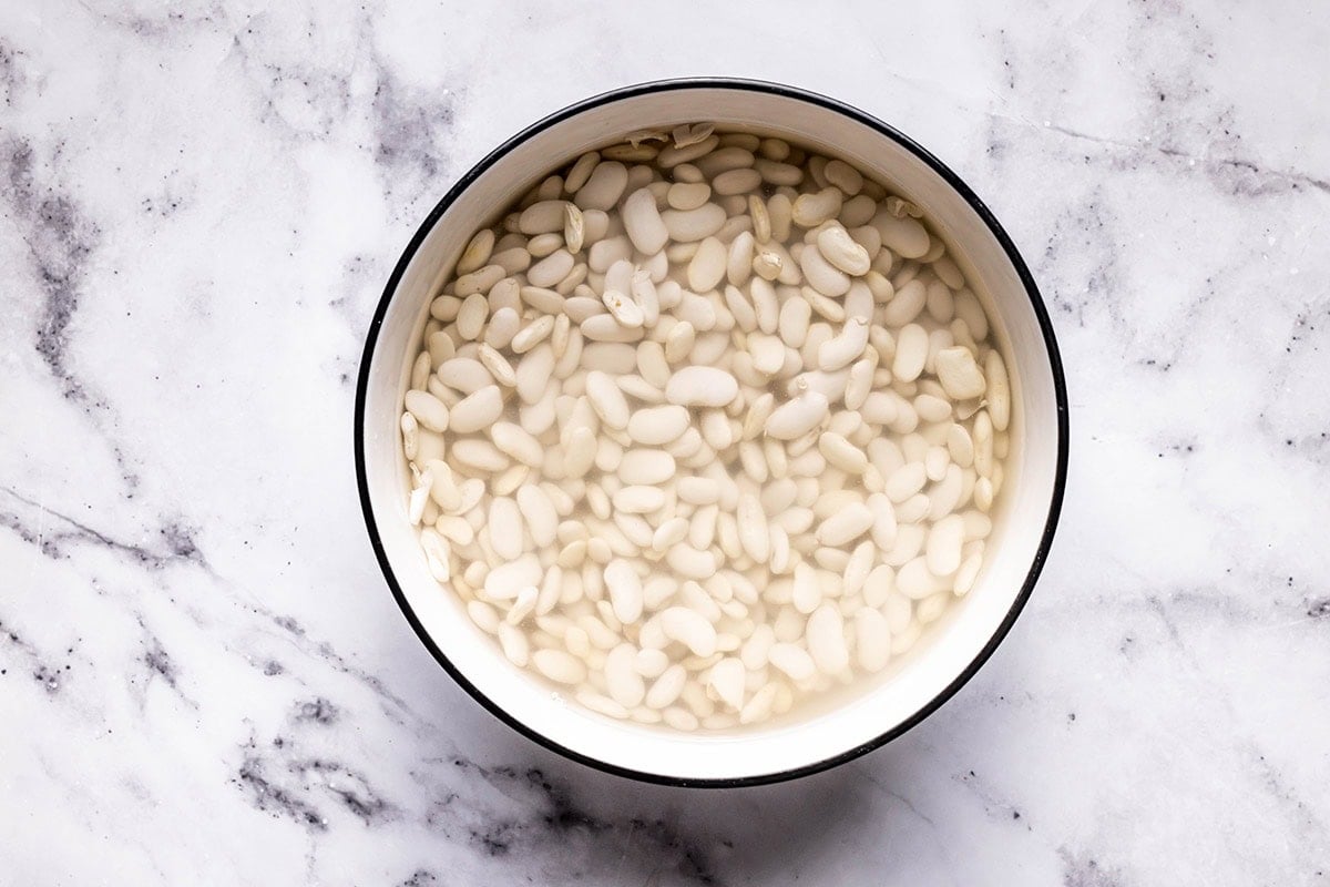 raw beans soaking in water.