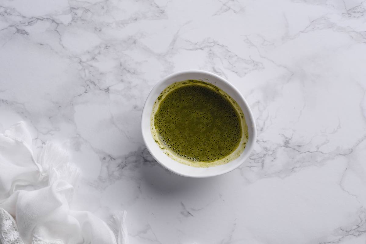 matcha powder mixed with water.