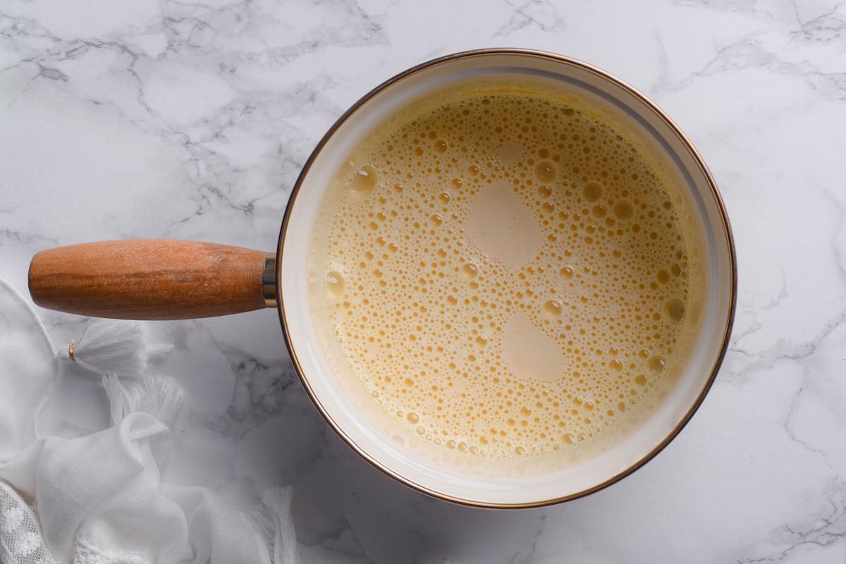 eggs, sugar, and milk in a saucepan.