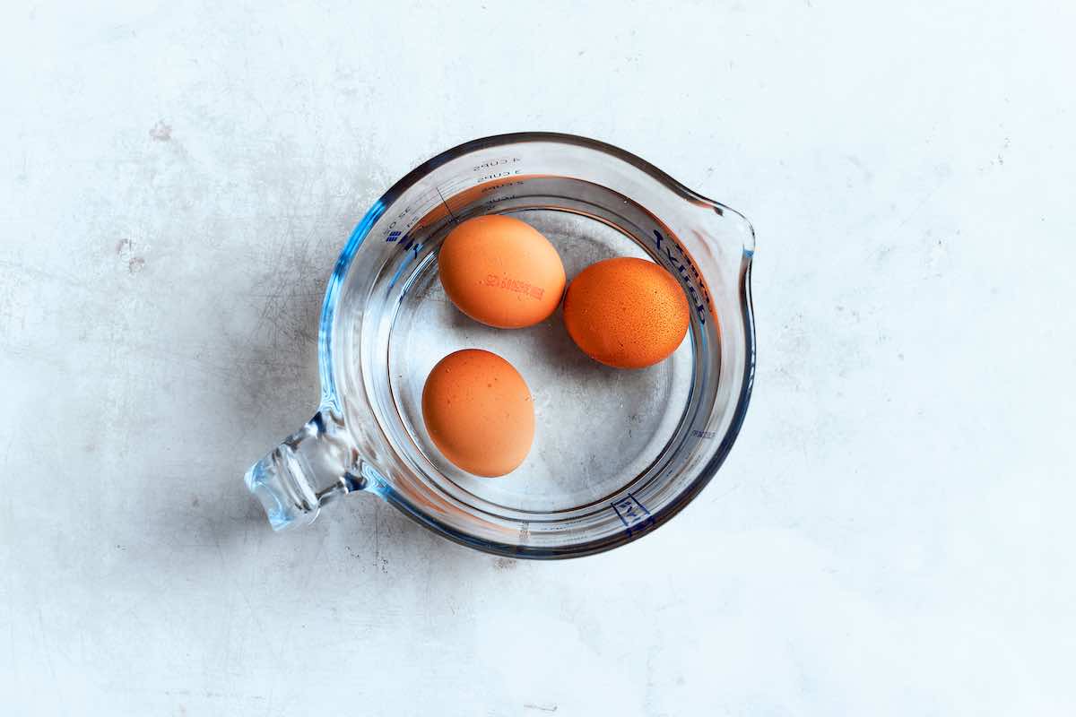 raw eggs in water with salt.