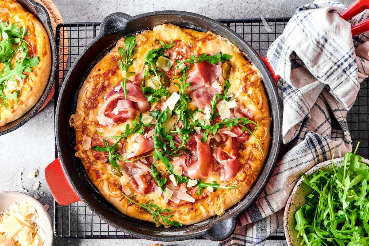 baked pizza in a cast iron skillet.