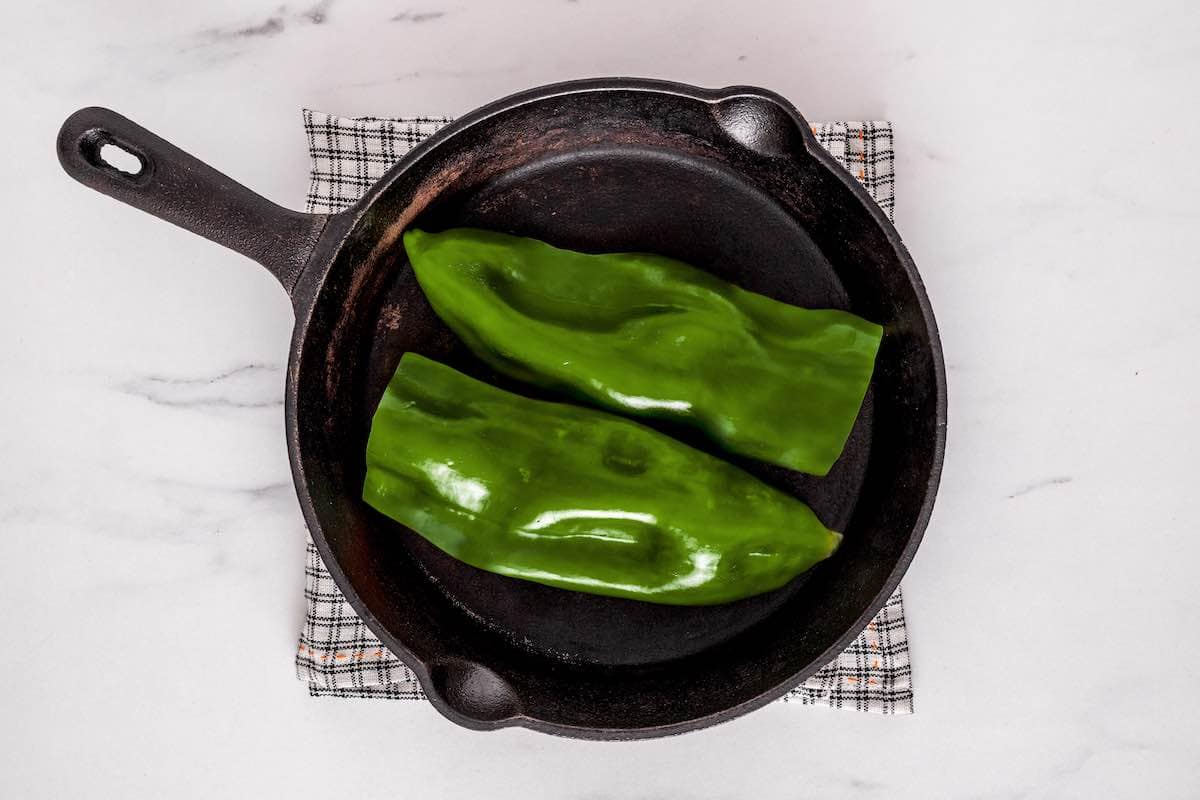 poblano peppers in a skillet.