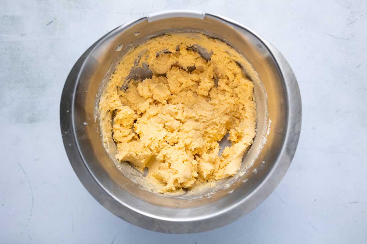 flour, butter, and sugar creamed in a bowl.