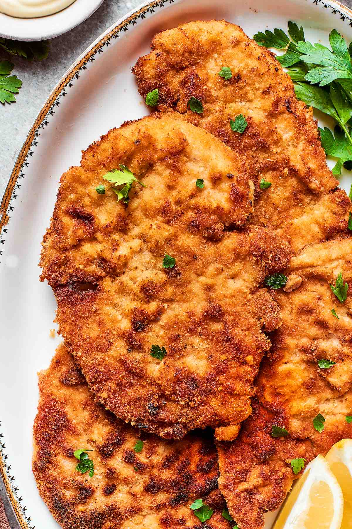 parmesan crusted chicken on a plate.