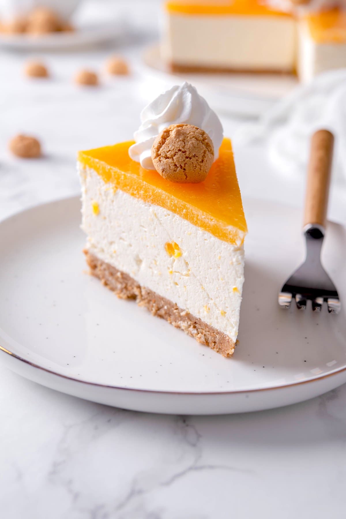 slice of peach cheesecake.