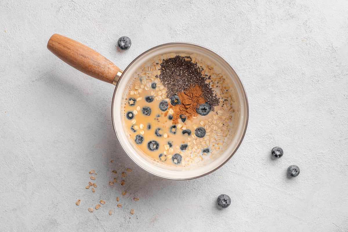 oats, chia seeds, cinnamon, and milk in a saucepan.