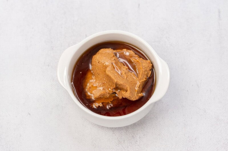 almond butter and maple syrup in a bowl.