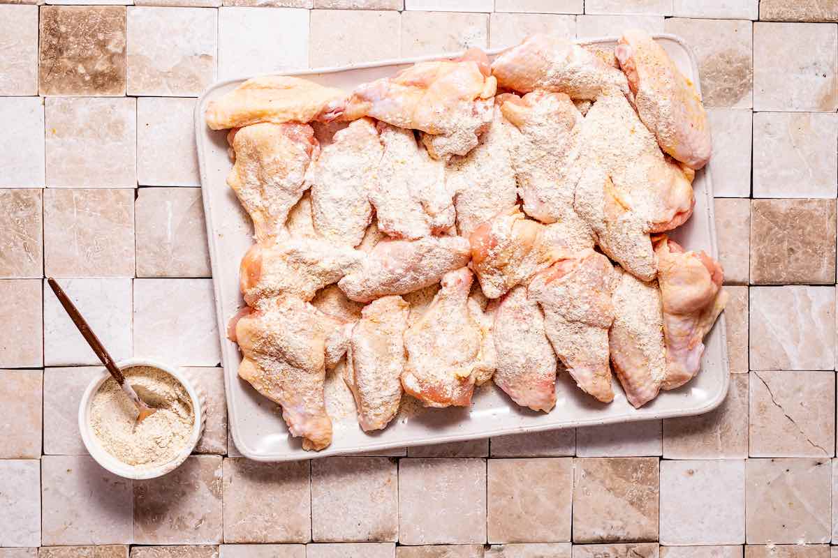 seasoned and flour-dredged chicken wings.