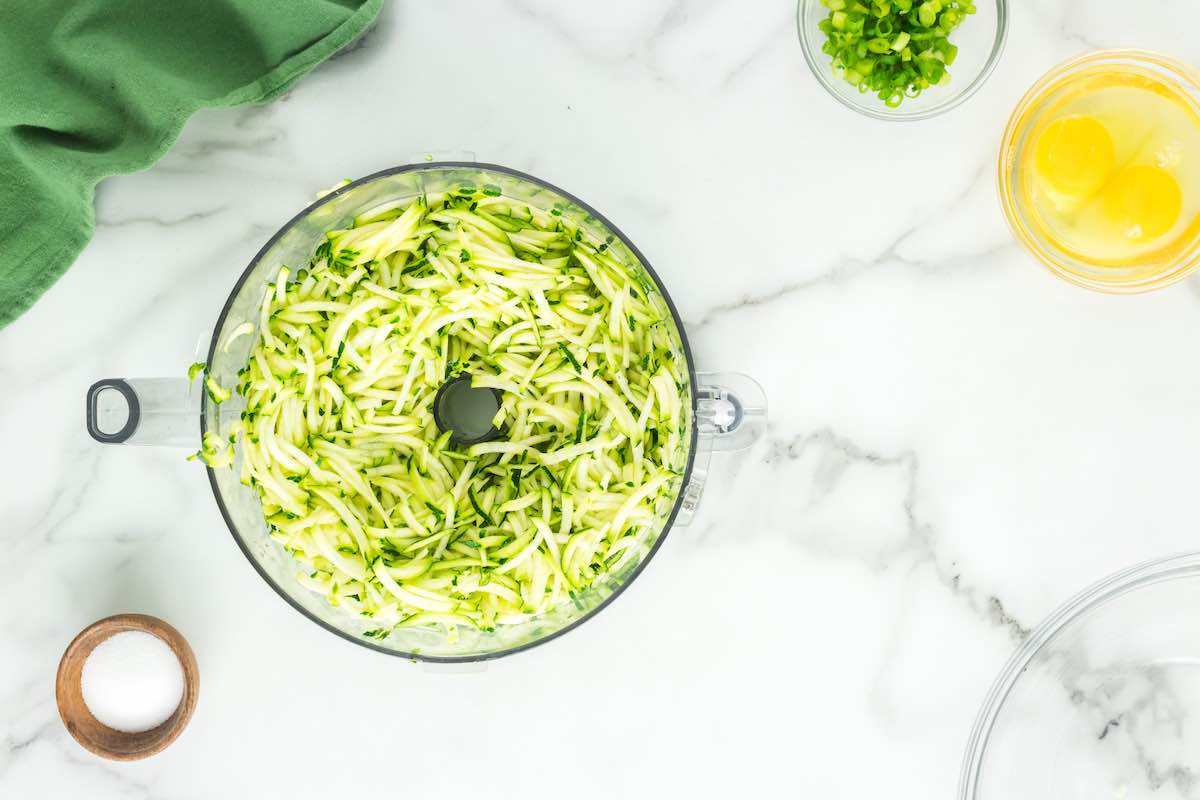 shredded zucchini in a bowl.