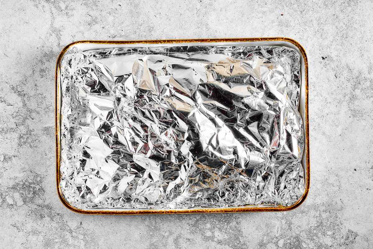 baked pork ribs in tin foil.