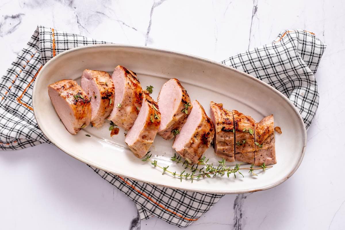 sliced cooked pork tenderloin.