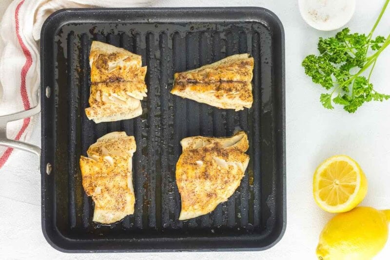 grilled grouper on a grill pan.