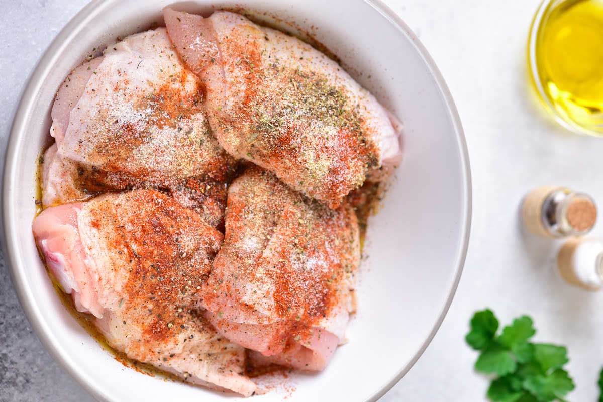 seasoned raw chicken thighs.