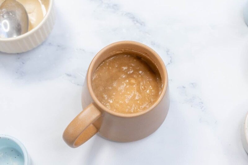 cake batter in a mug.