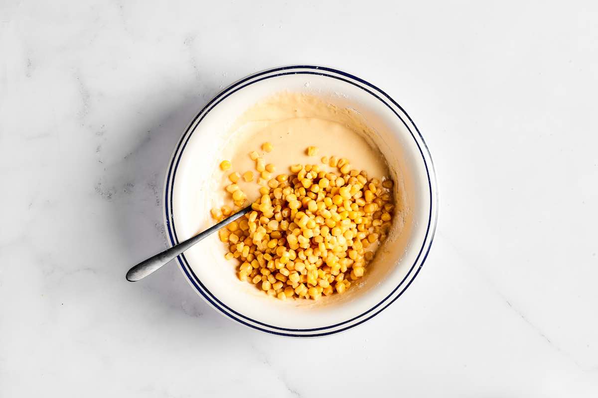 folding corn into the corn nugget batter.